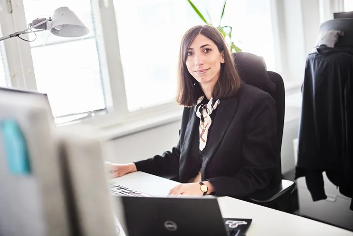 Data analyst in front of computer