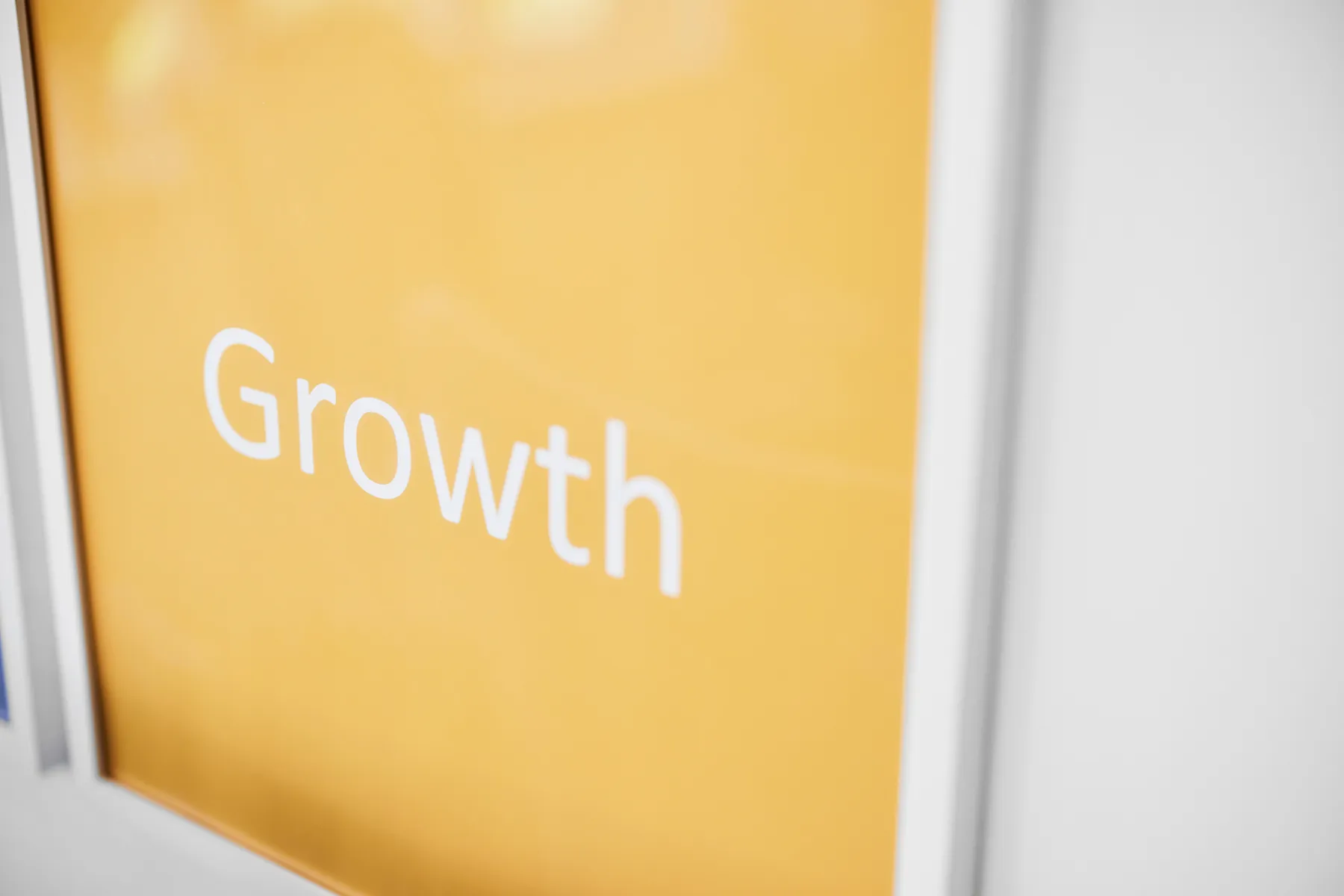 Growth-White word in yellow background